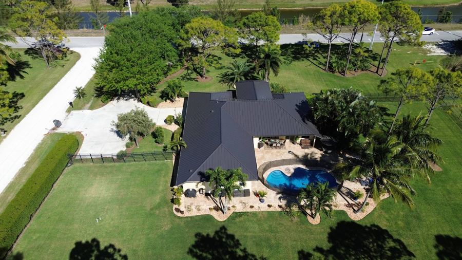 Roof in The Acreage put on by Ranger Roofing, drone photo from March 2025